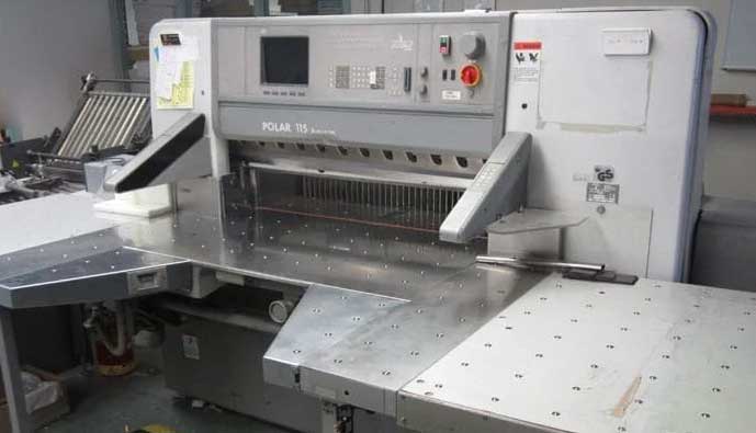Polar programmable paper cutters